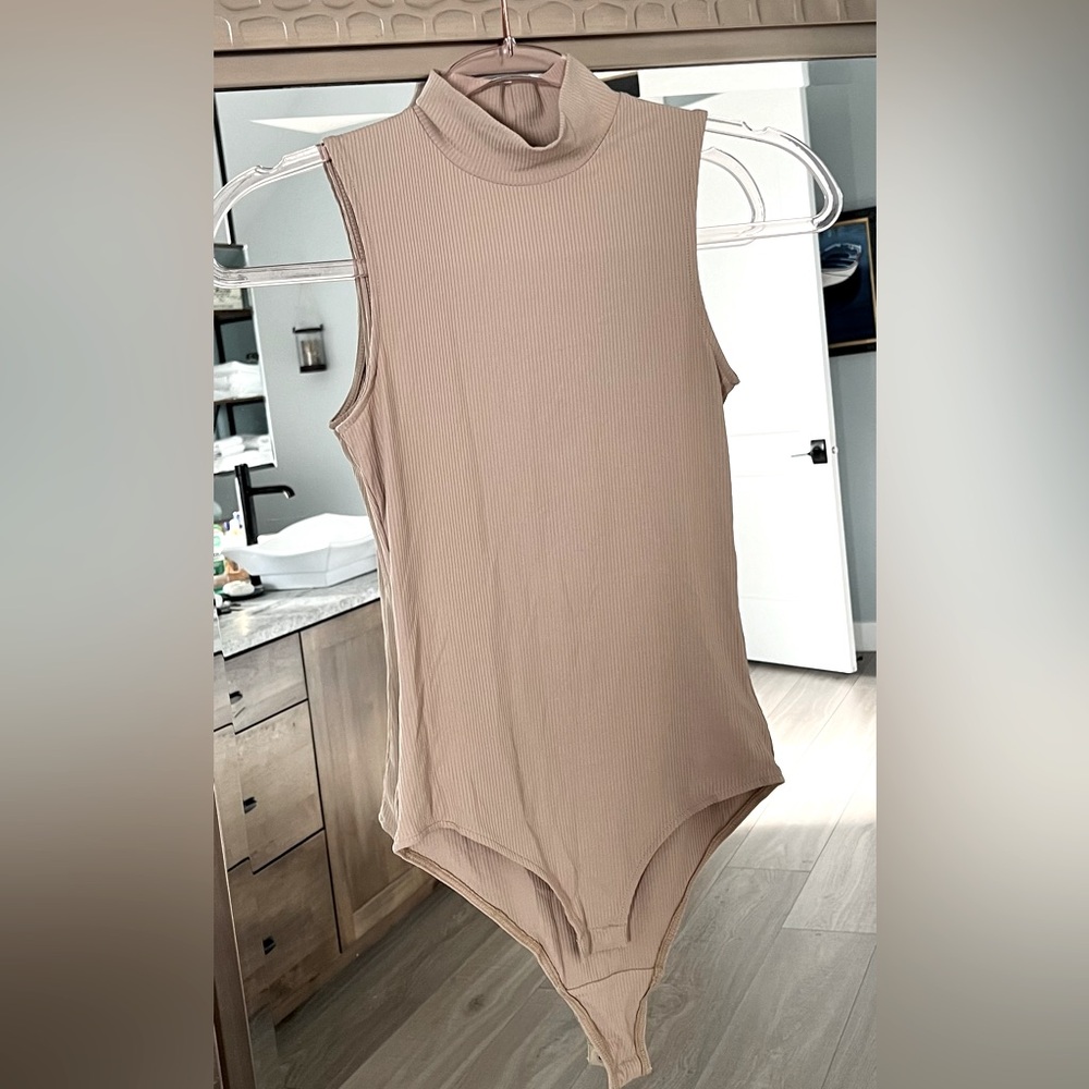 Sleeveless mock neck top bodysuit